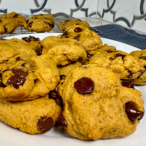 vegan pumpkin chocolate chip cookies on a white plate